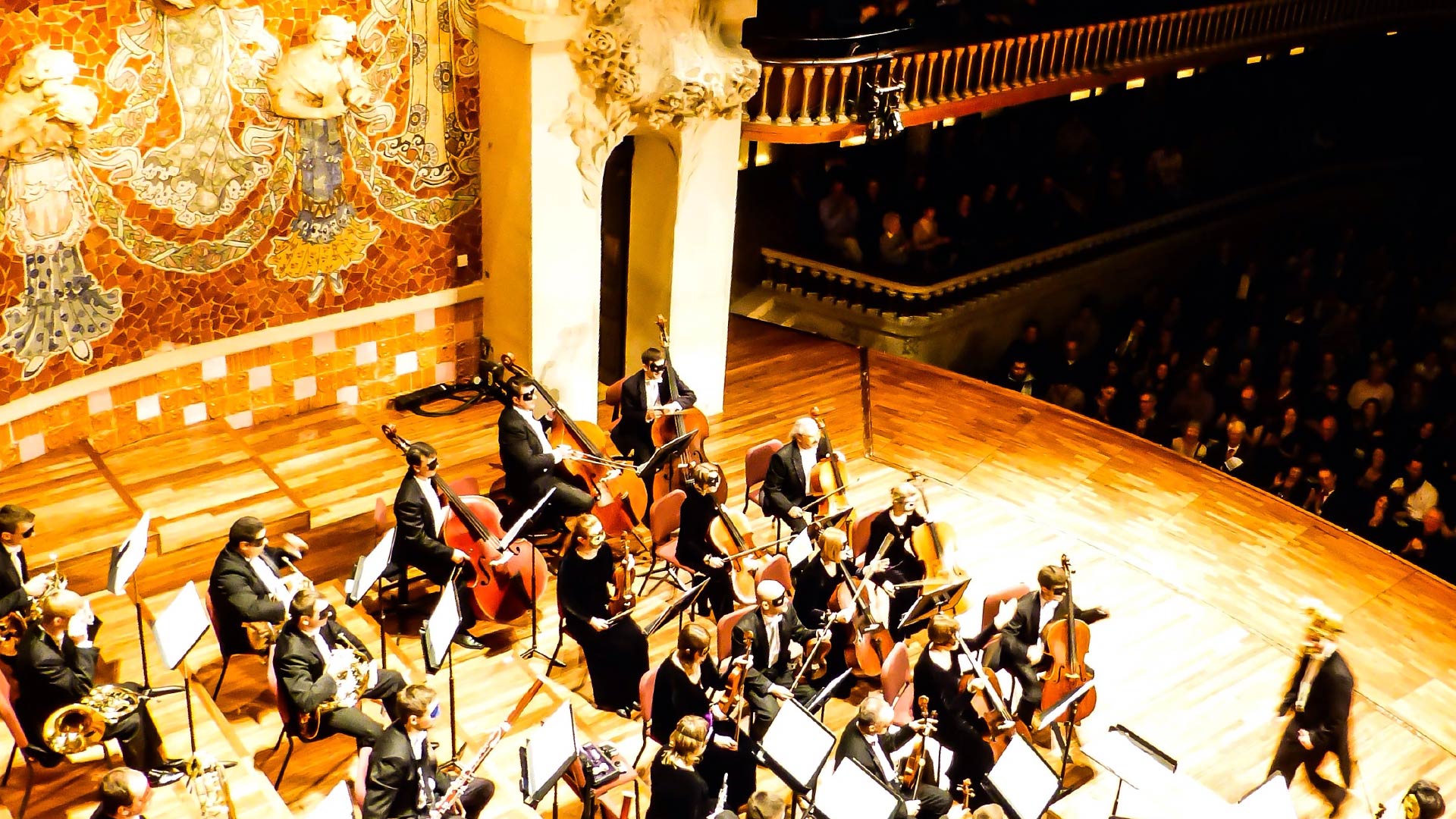 an orchestra is playing in a teater