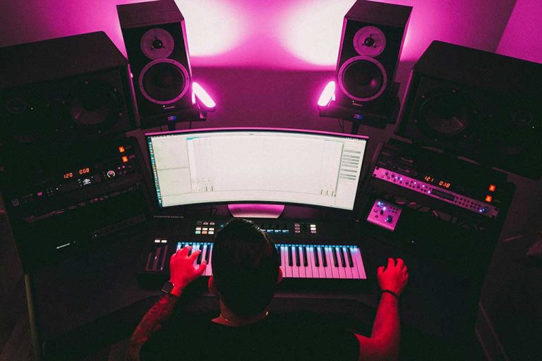 A man is doing his audio production