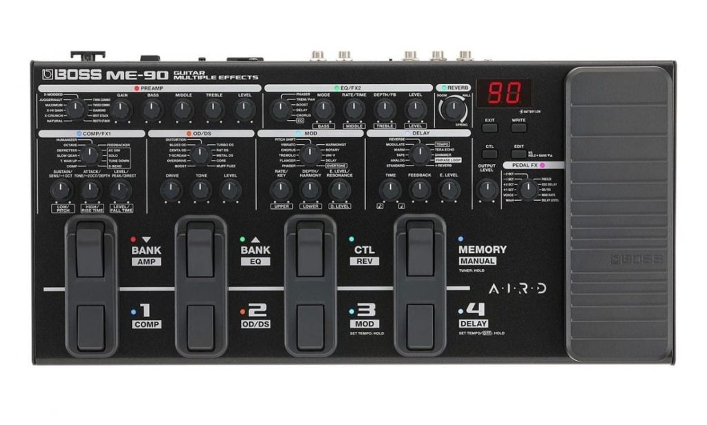 A guitarist using a ME90 multi effects processor made by Boss